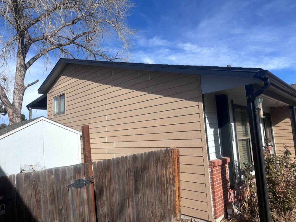 Two-story home exterior repaint