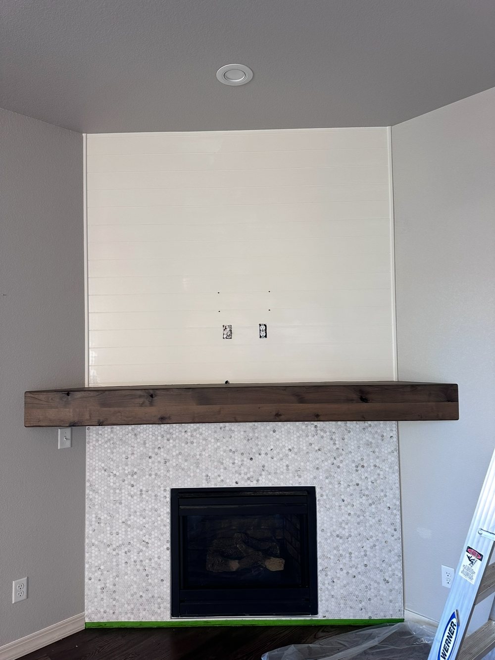 Living room with fireplace and custom mantel