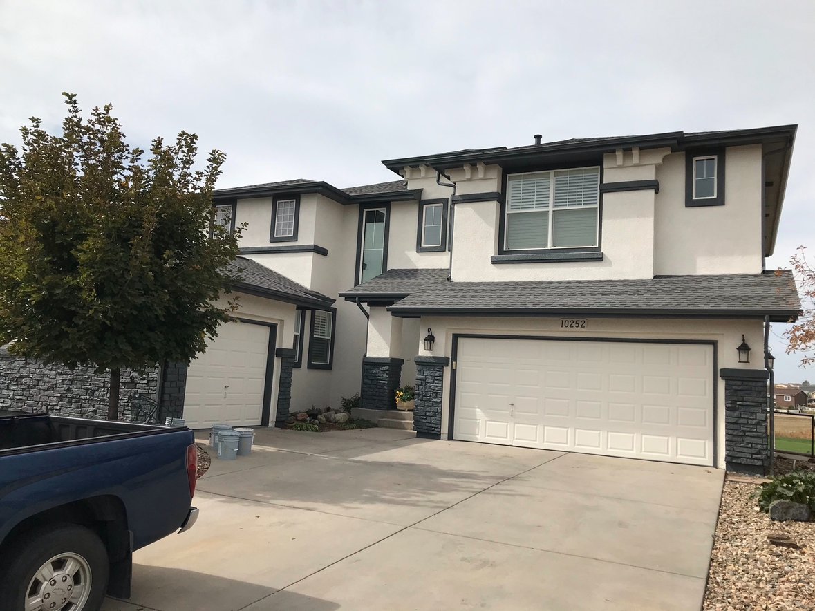 Exterior repaint of a two-story Colorado Springs home by M-G Painting